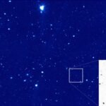 A Subaru Telescope Hyper Suprime-Cam image showing comet 28P/Neujmin as a faint point of light among thousands of background stars and galaxies, with an enlarged inset highlighting the comet's location.
