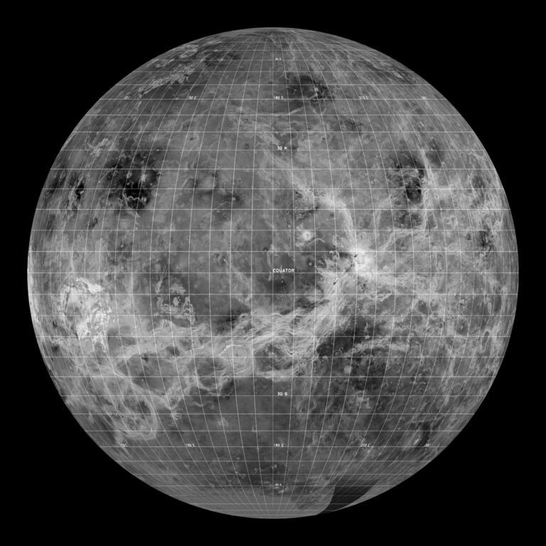 Computer-simulated global radar view of Venus's volcanic surface, mapped by NASA's Magellan spacecraft, showing the solid planet hidden beneath its thick, fast-moving cloud layer